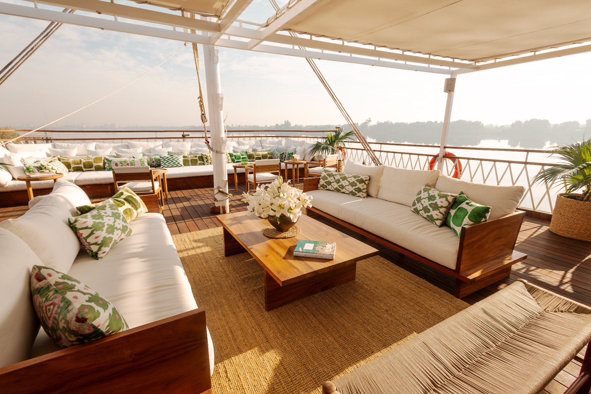 The upper deck lounge of the Gaïa at golden hour